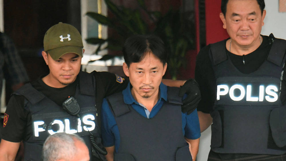North Korean suspect in Kim Jong Nam murder, Ri Jong Chol, leaves a Sepang police station to be deported, in Malaysia March 3, 2017 [Kyodo via Reuters]