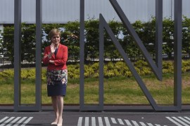 Nicola Sturgeon, the First Minister of Scotland, stands in front of a sign at a EU referendum remain event, at Edinburgh airport in Edinburgh