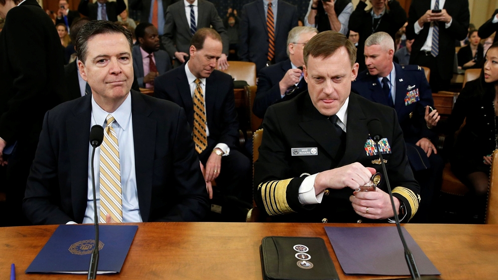 FBI Director James Comey, left, and National Security Agency Director Mike Rogers faced the House Intelligence Committee on Monday [Joshua Roberts/Reuters]