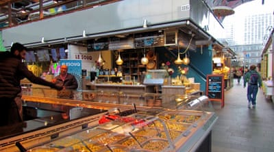 Markthal, the port city's colourful indoor food market [Venetia Rainey/Al Jazeera]