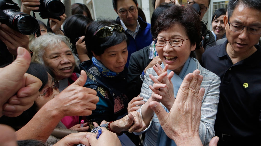 The vote is forecast to usher in Leung Chun-ying's former deputy Carrie Lam [Kin Cheung/AP]
