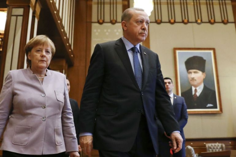 Turkish President Erdogan and German Chancellor Merkel arrive for a bilateral meeting in Ankara
