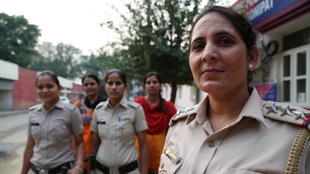 Parmila Dalal, the second-in-command at the women's police station in Sonipat, spends much of her time mediating in family disputes, attempting to keep peace and cohesion within her community wherever possible [Rumi Hamid and Misha Maltsev]