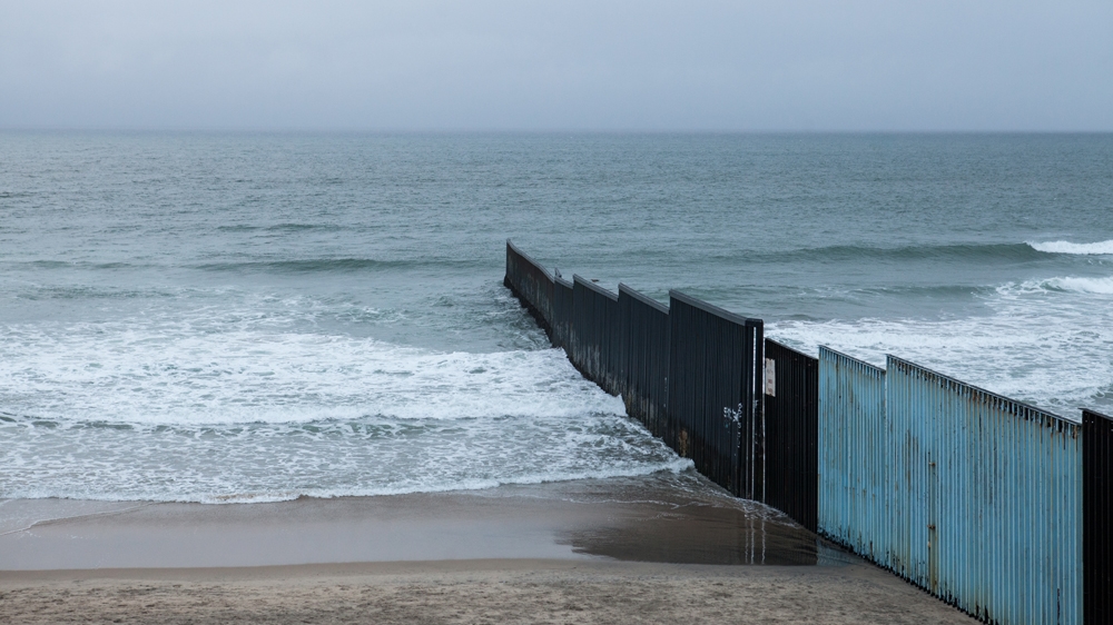 The US-Mexico wall as seen from Playas de Tijuana in Mexico [Jessica Chou/Al Jazeera] 