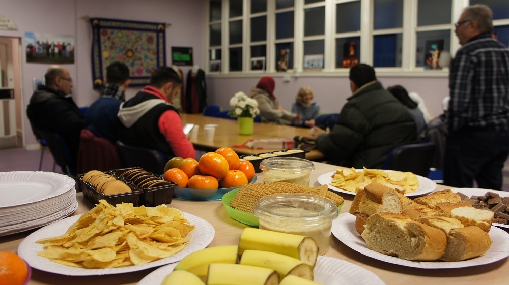 Every week, refugees gather at the Maryhill Integration Network in Glasgow to participate in workshops and learn English [Zab Mustefa/Al Jazeera]