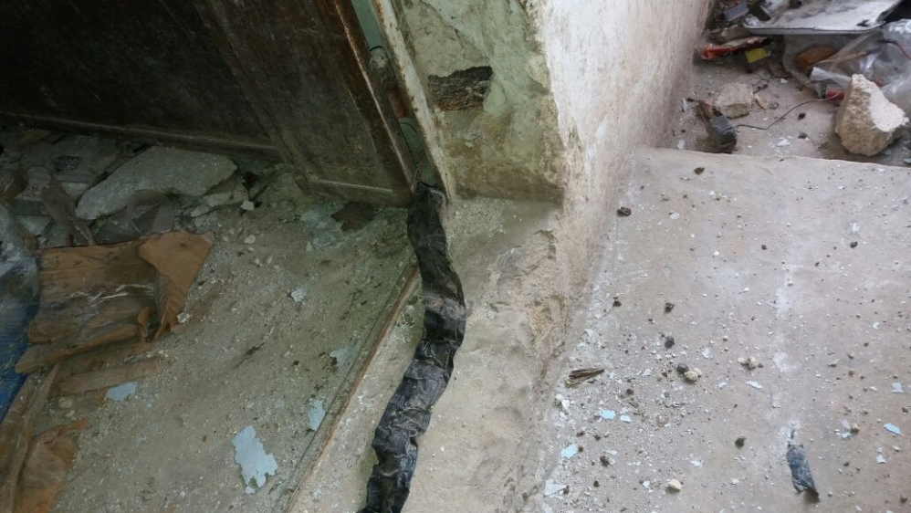 This IED was hidden in the doorstep of a house in Al Bab [SMAC/Al Jazeera]