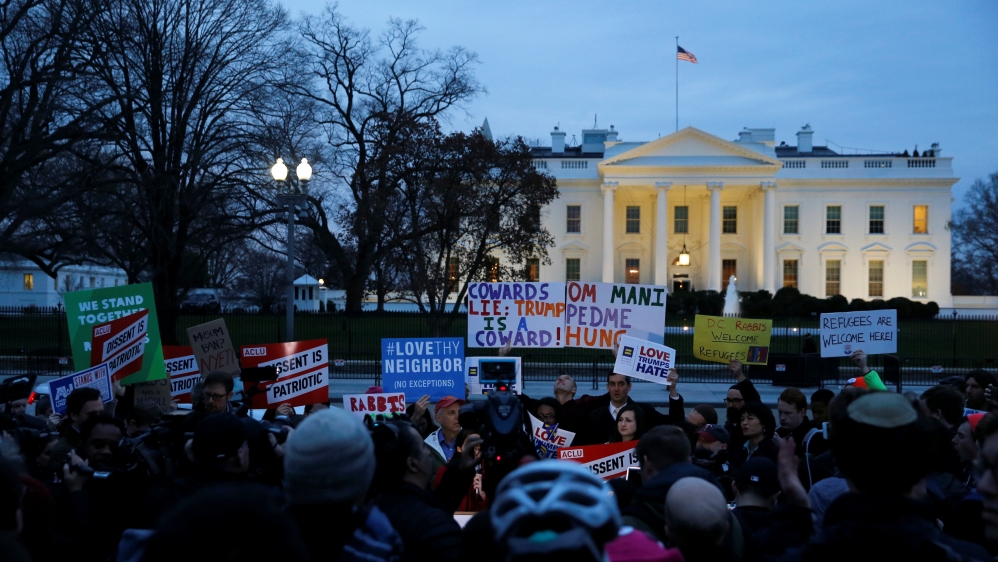 Demonstrators rally outside of the White House, Washington, DC [Jonathan Ernst/Reuters]