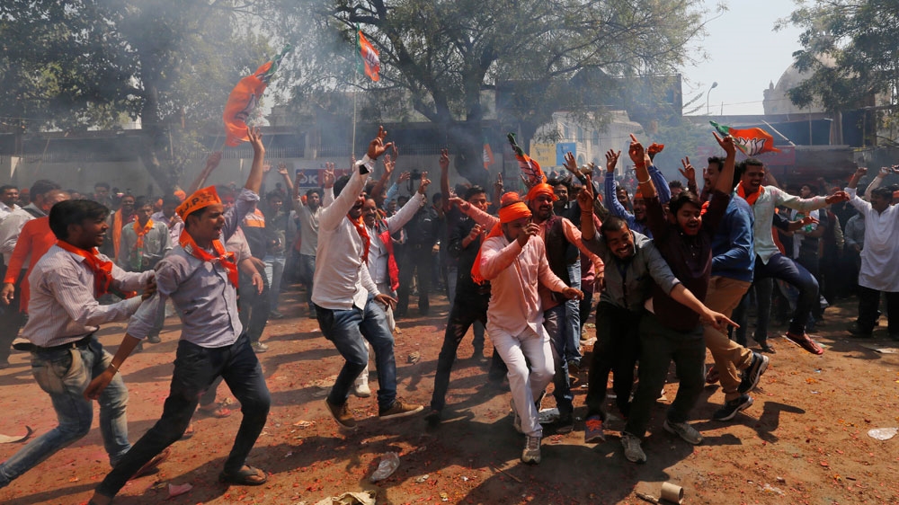 The announcement of the results sparked celebrations among BJP supporters [AP]