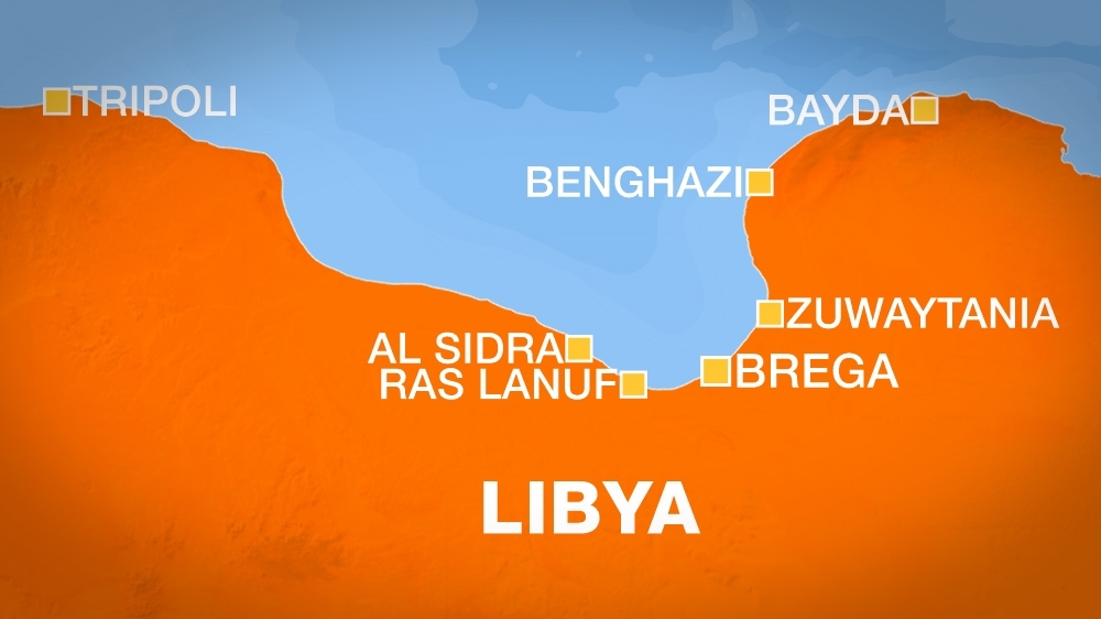 Rival factions fight over key oil ports [Al Jazeera]