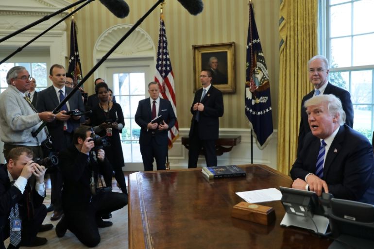 U.S. President Donald Trump talks to journalist at the Oval Office of the White House after the AHCA health care bill was pulled before a vote in Washington, U.S.