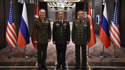Chief of the General Staff of the Turkish Armed Forces, Hulusi Akar, centre, US Chairman of the Joint Staff General Joseph Dunford, left, and Russian Chief of General Staff General Valery Gerasimov, right, after their meeting in Antalya, Turkey on March 7 [EPA]