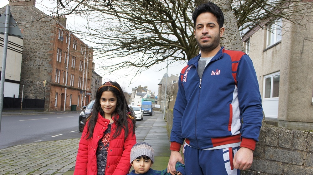 Ahmad Mahmoud, centre, says the locals on the Isle of Bute have been very welcoming to Syrian families [Zab Mustefa/Al Jazeera]