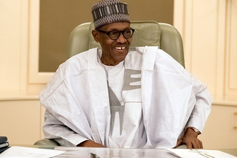 Nigeria''s President Muhammadu Buhari smiles as he resumes work following seven weeks of medical leave, in Abuja