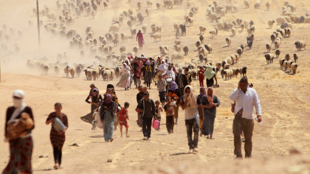 ISIL kidnapped Yazidis from Sinjar and forced them to become sex slaves or fighters [Rodi Said/Reuters]