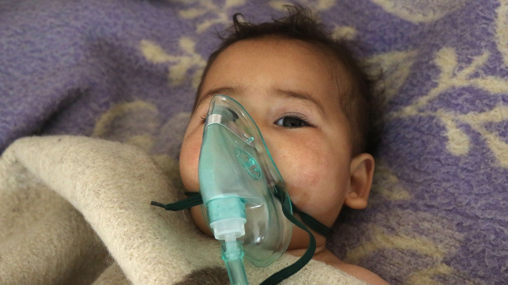 The Syrian Observatory for Human Rights said dozens suffered respiratory problems and other symptoms [Mohamed al-Bakour/AFP]