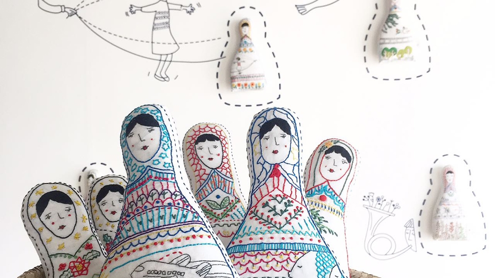 Each doll bears the name of a Syrian mother and tells the story of her children [Courtesy of the Ana Collection/Al Jazeera]