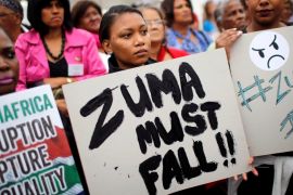 Demonstrators protest against South African President Jacob Zuma''s firing of Finance Minister Pravin Gordhan, outside Parliament in Cape Town
