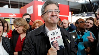 Melenchon, on the far left, is critical of economic liberalism and the EU [Charles Platiau/Reuters]