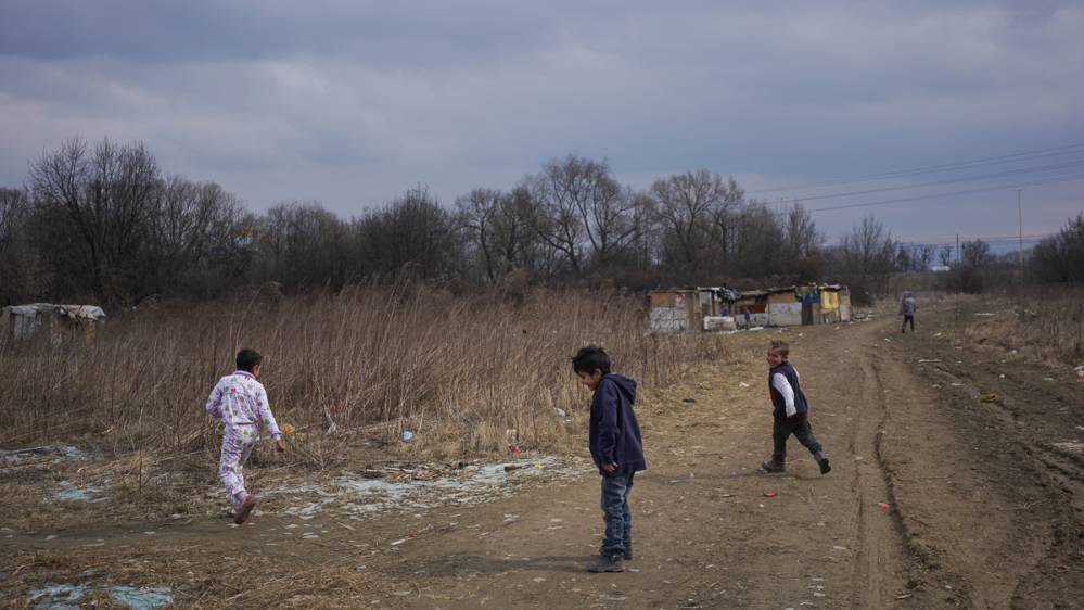 Children play in the Roma slum in Lunik IX [Sorin Furcoi/Al Jazeera]