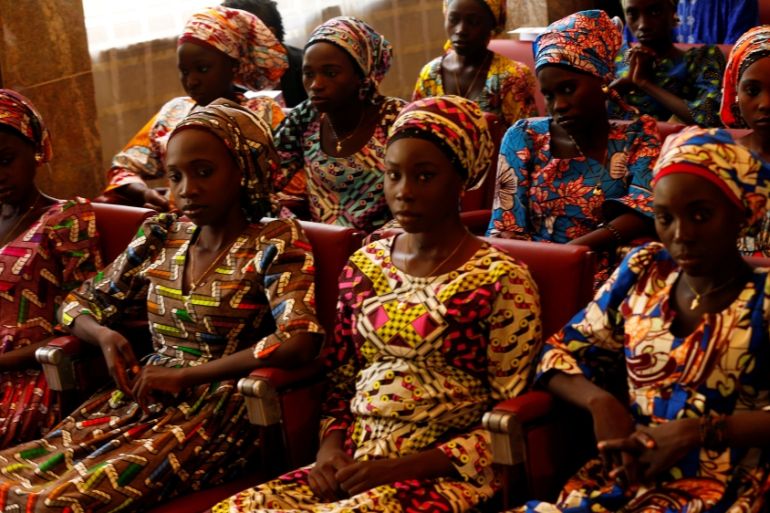 Some of the 21 Chibok schoolgirls released by Boko Haram look on during their visit to meet President Muhammadu Buhari In Abuja, Nigeria