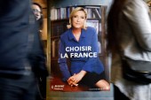 Although stopping short from presenting herself as a 'feminist', Le Pen has tried to appeal to French women by looking and behaving in a more approachable way, writes Poirier [Sebastien Nogier/EPA]