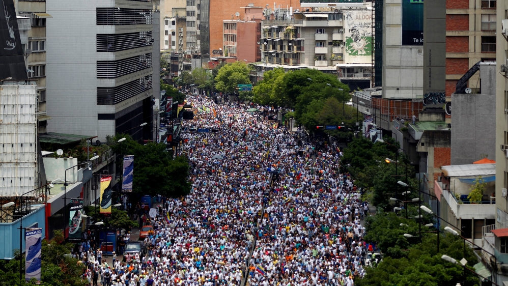 Caracas has seen a second day of anti-government protests [Christian Veron/Reuters]