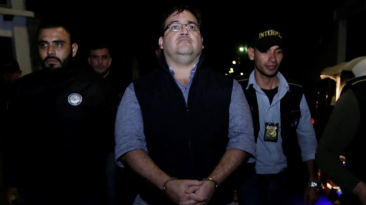 Former governor of Mexican state Veracruz Javier Duarte is escorted by authorities after he was detained in a hotel in Panajachel