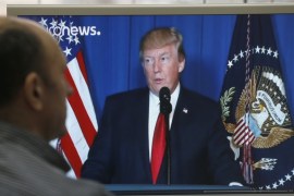 Russians watch US President Donald J. Trump announcing US strikes in Syria