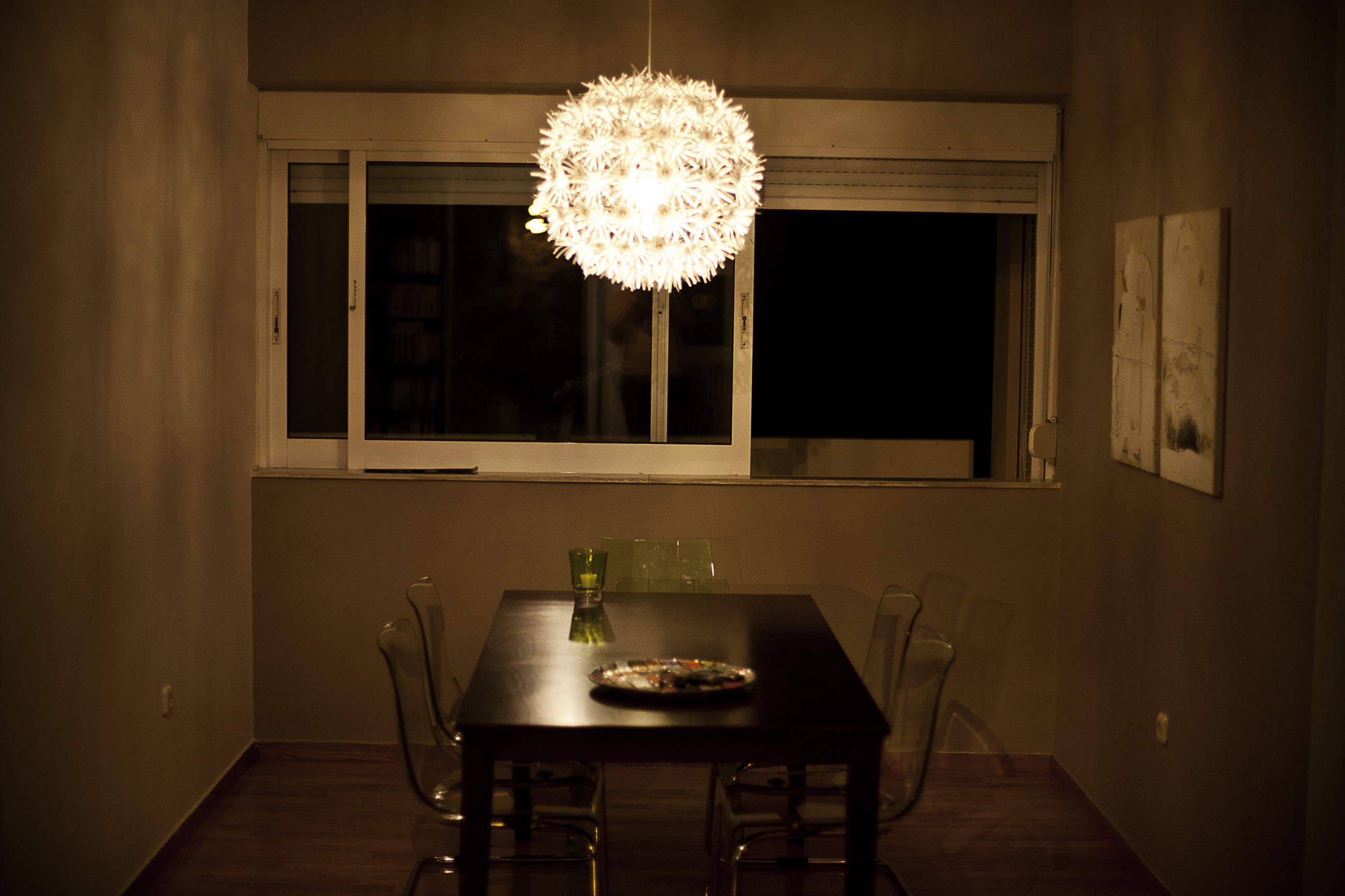 At Emmy's house, an empty table waits for someone who will never come [Paulo Siqueira/Al Jazeera]