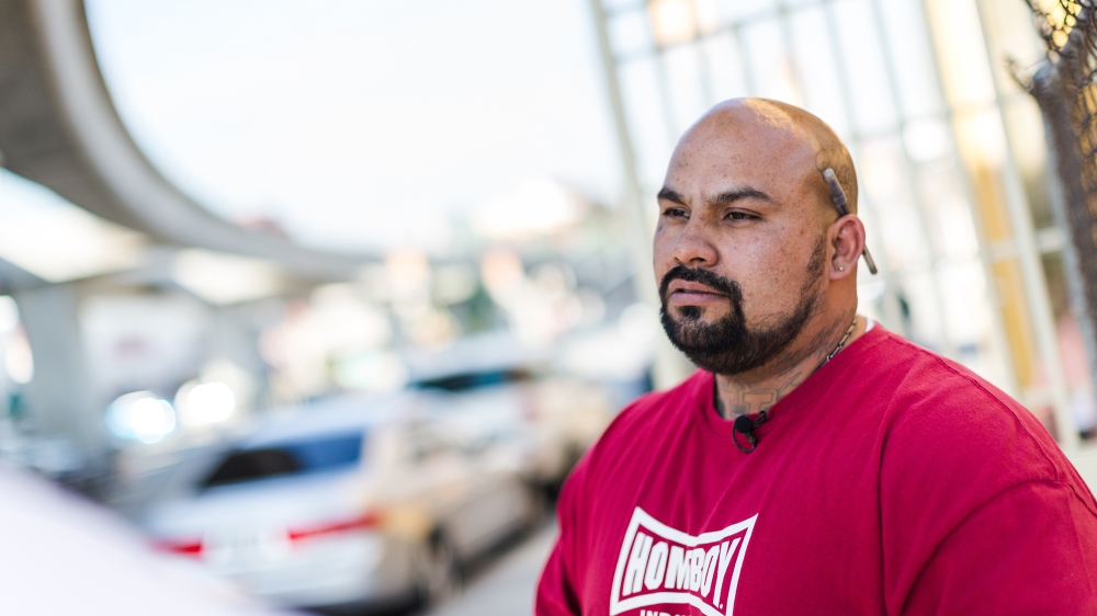 Javier Chavez helps former gang members cope with challenges of their life outside of gangs and prisons [Kate Kelley/Devlo Media]