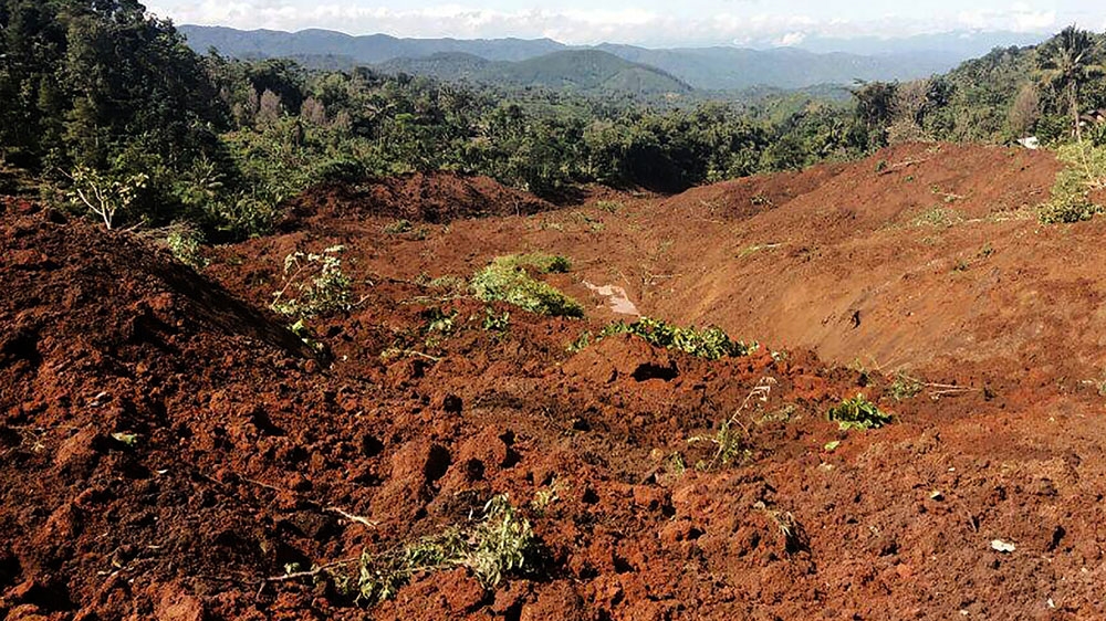 Residents were harvesting ginger on a hillside when the landslide struck on Saturday [BNPB Handout/AFP]