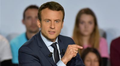 Macron, a centrist, has defended open immigration [Philippe Laurenson/Reuters]