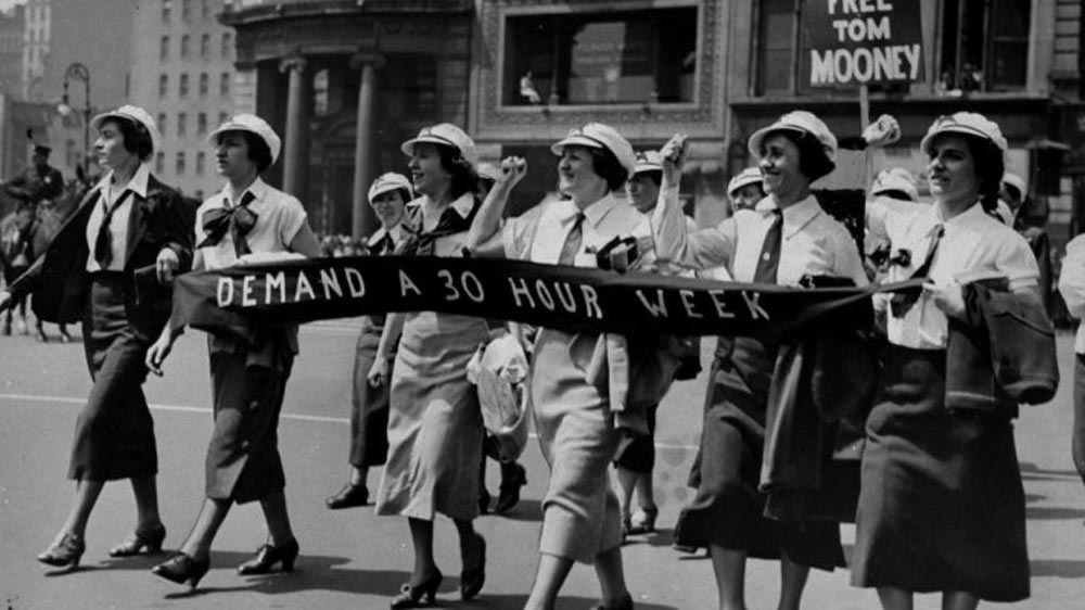 Female workers in the May Day Parade in New York City in 1936 [File: New York Daily News Archive/Getty Images]