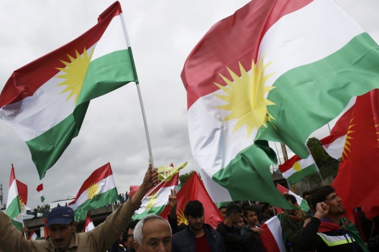 People carry Kurdistan flags during a May Day demonstration in Istanbul