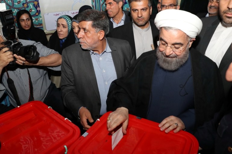 Iran''s President Hassan Rouhani casts his ballot during the presidential election in Tehran