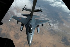 US Air Force F-16 receives fuel from fuel boom suspended from US Air Force KC-10 Extender during mid-air refueling support to Operation Inherent Resolve over Iraq and Syria air space