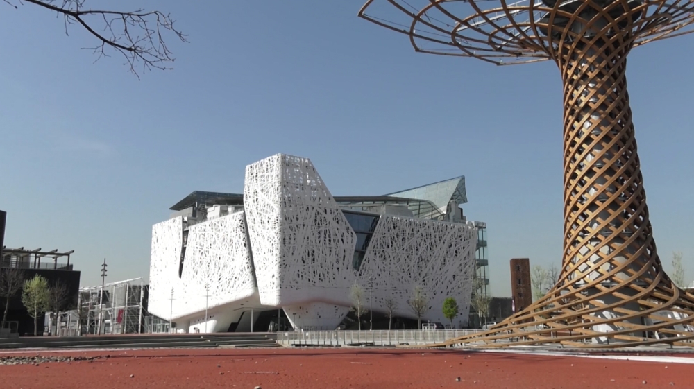 Completed in 2015, the Palazzo Italia in Milan is one of the first buildings in the world that uses cement which cleans the air [Screengrab/Al Jazeera]