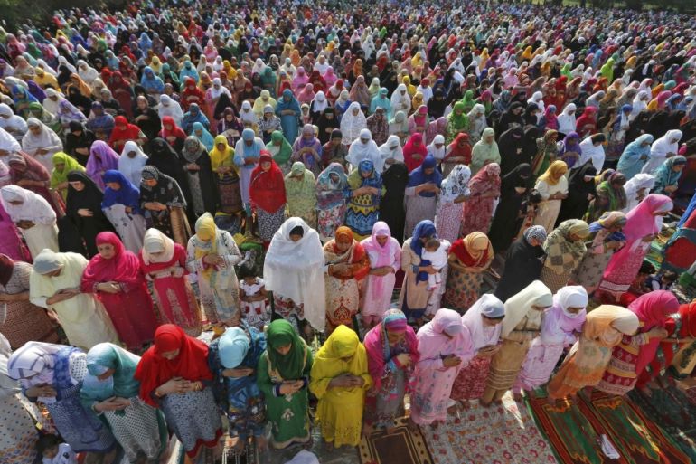 Muslim women attend Eid al-Fitr prayers to mark the end of the holy fasting month of Ramadan in Srinagar