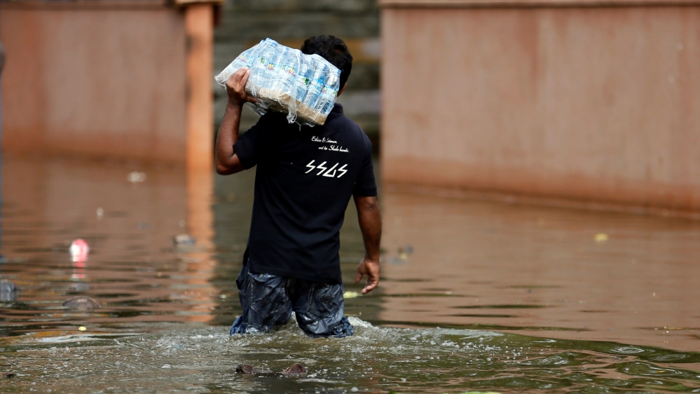 Sri Lanka has appealed for bottled water for those displaced by the disaster [Dinuka Liyanawatte/Reuters]