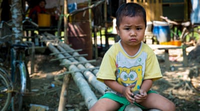 A child in Seikkyi Khanaungdho township. As many as 20.3 percent of children in Yangon are stunted, a condition reflecting chronic malnutrition. Five percent are severely stunted [Katie Arnold/Al Jazeera]