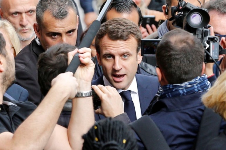 Emmanuel Macron, head of the political movement En Marche !, or Onwards !, and candidate for the 2017 presidential election, speaks with supporters during a campaign visit in Rodez