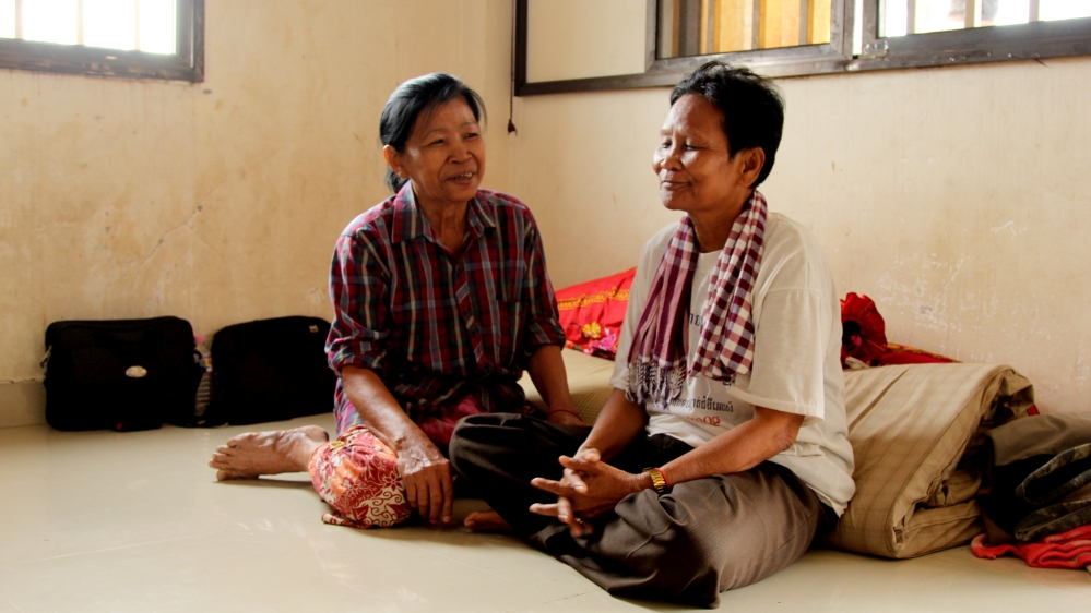 Noy Sitha, right, met Hong Saroeun, her lifelong partner, while the Khmer Rouge was in power [Laura Villadiego/Al Jazeera]