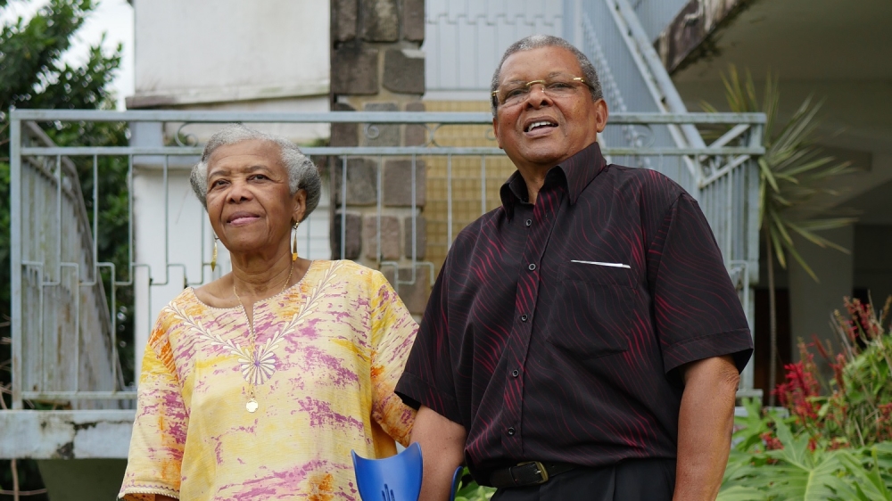 Solange Coudrieux, right, was one of many Guadeloupeans to be shot by French police on May 26, 1967. Fifty years on, he and his wife Josselyne, among many others in Guadeloupe, are still waiting for France to officially acknowledge the government's role in the brutality that took place [Finbar Anderson/Al Jazeera]