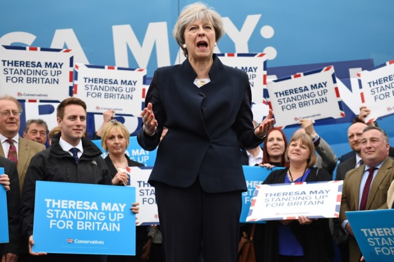 Britain''s PM May addresses supporters and members of the media at an airfield north of Newcastle