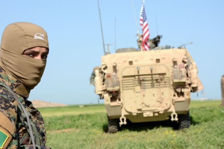 The Kurdish YPG militia and US military units patrol the Syrian-Turkish border
