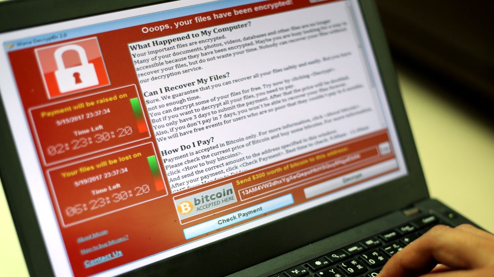 WannaCry encrypts your files and demands payment to regain access [Richie Tongo/EPA]