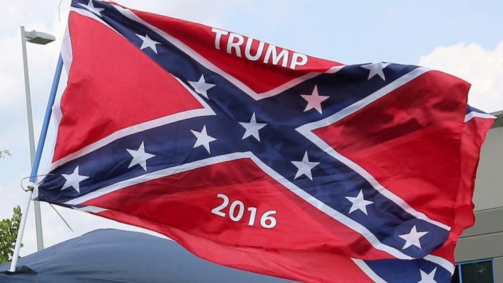 FILE PHOTO: A vendor flies the confederate flag prior to a Republican U.S. presidential candidate Donald Trump rally in Pittsburgh