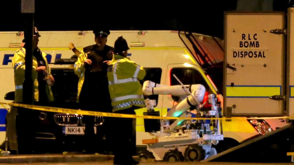 A bomb disposal robot is unloaded outside the Manchester Arena [Nigel Roddis/EPA] 
