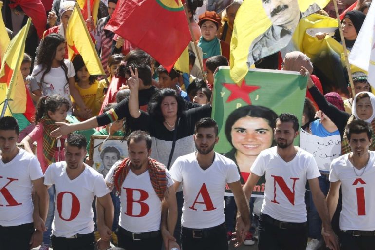File photo of people taking part in a demonstration against Islamic State insurgent attacks on the Syrian Kurdish town of Kobani, in Beirut