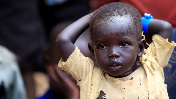 A child displaced by fighting in South Sudan arrives in Lamwo after fleeing fighting in Pajok town across the border in northern Uganda